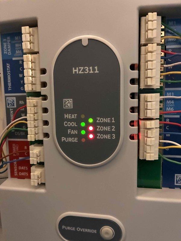 Completed main level AC repair involving the multi-zone HVAC control system. Serviced and tested the HZ311 zone controller module, verifying proper operation of all three zones with heat, cool, fan, and purge functions operating correctly as indicated by the LED status indicators. Inspected and confirmed secure connections at all terminal blocks and thermostat control boards, ensuring proper wiring integrity throughout the system including the relay contactors and control circuitry within the electrical panel. Completed main level AC repair involving the multi-zone HVAC control system. Serviced and tested the HZ311 zone controller module, verifying proper operation of all three zones with heat, cool, fan, and purge functions operating correctly as indicated by the LED status indicators. Inspected and confirmed secure connections at all terminal blocks and thermostat control boards, ensuring proper wiring integrity throughout the system including the relay contactors and control circuitry within the electrical panel.