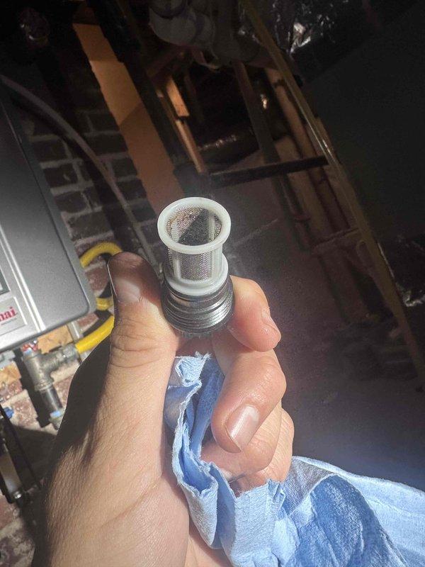 Performed routine maintenance flush on Rinnai tankless water heater unit. Removed and cleaned inlet filter screen, which showed moderate sediment accumulation, then completed full system flush to remove mineral deposits and ensure optimal performance and efficiency. Performed routine maintenance flush on Rinnai tankless water heater unit. Removed and cleaned inlet filter screen, which showed moderate sediment accumulation, then completed full system flush to remove mineral deposits and ensure optimal performance and efficiency.