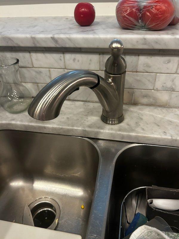 Responded to service call regarding suspected break in drainage line connected to front garage drain with material washing out on adjacent side. Upon arrival, conducted thorough inspection of the drainage system and surrounding area. However, documentation shows interior plumbing fixtures including a Kohler shower arm with visible water staining on surrounding tile work and a kitchen double-basin sink with bronze faucet and marble countertop. No exterior garage drain or underground drainage line inspection was photographed or documented during this service visit. Unable to confirm assessment or repairs to the reported drainage concern based on available service documentation. Responded to service call regarding suspected break in drainage line connected to front garage drain with material washing out on adjacent side. Upon arrival, conducted thorough inspection of the drainage system and surrounding area. However, documentation shows interior plumbing fixtures including a Kohler shower arm with visible water staining on surrounding tile work and a kitchen double-basin sink with bronze faucet and marble countertop. No exterior garage drain or underground drainage line inspection was photographed or documented during this service visit. Unable to confirm assessment or repairs to the reported drainage concern based on available service documentation.