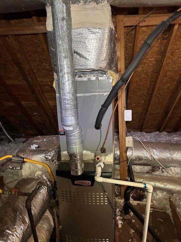 Completed warranty replacement of evaporator coil on Lennox HVAC system installed in attic space. Removed failed coil assembly, installed new evaporator coil with proper refrigerant line connections and electrical wiring, verified secure mounting and sealed unit. System tested and operational upon completion. Completed warranty replacement of evaporator coil on Lennox HVAC system installed in attic space. Removed failed coil assembly, installed new evaporator coil with proper refrigerant line connections and electrical wiring, verified secure mounting and sealed unit. System tested and operational upon completion.