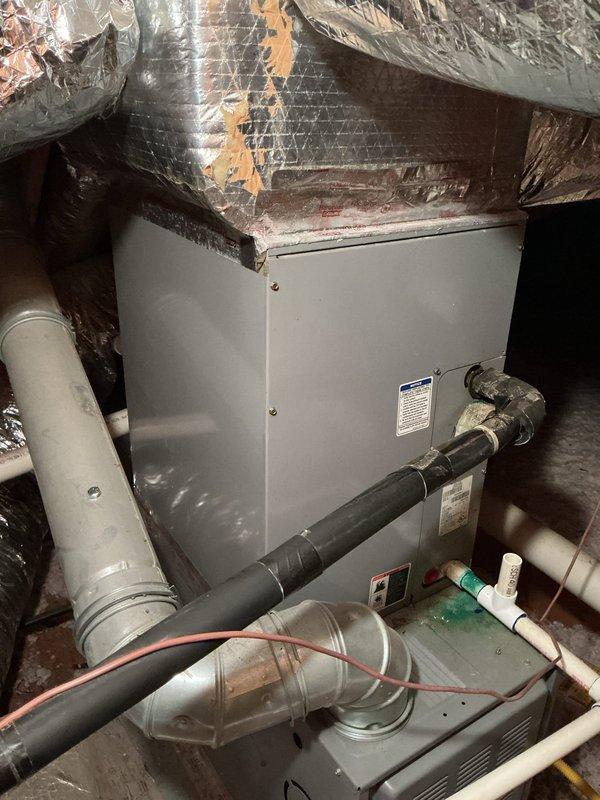 Conducted on-site evaluation of three-unit HVAC system where one unit has failed after over 15 years of service. Documented existing attic-mounted air handler installation with associated ductwork, condensate drain lines, and Honeywell thermostat. Provided comprehensive estimate and project timeline for potential replacement of remaining two operational units to prevent future system failures. Conducted on-site evaluation of three-unit HVAC system where one unit has failed after over 15 years of service. Documented existing attic-mounted air handler installation with associated ductwork, condensate drain lines, and Honeywell thermostat. Provided comprehensive estimate and project timeline for potential replacement of remaining two operational units to prevent future system failures.