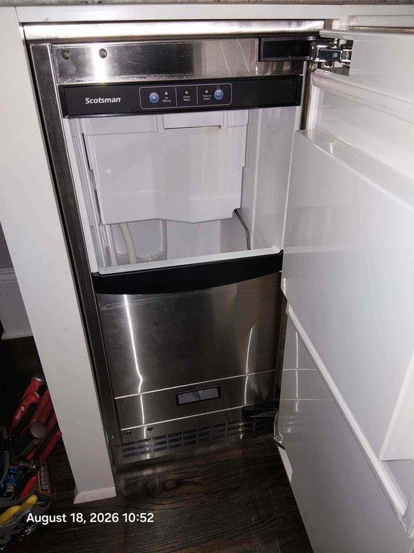 Responded to service call for clogged drain line on built-in Scotsman ice maker. Upon inspection, accessed the drain connection located in the cabinet beneath the unit and found the drain line experiencing restricted flow. Cleared the blockage from the ice maker's drain line, verified proper drainage, and tested the unit to ensure water was flowing freely through the system without backup or overflow issues. Responded to service call for clogged drain line on built-in Scotsman ice maker. Upon inspection, accessed the drain connection located in the cabinet beneath the unit and found the drain line experiencing restricted flow. Cleared the blockage from the ice maker's drain line, verified proper drainage, and tested the unit to ensure water was flowing freely through the system without backup or overflow issues.