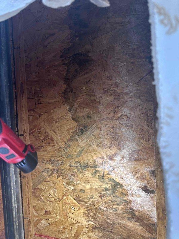 Responded to service call for leak detection and repair. Located active water leak in attic space causing moisture intrusion through ceiling and interior wall damage. Accessed crawl space to identify source of leak, documented extensive water staining and deteriorated drywall with visible moisture penetration. Cut access opening in affected wall to expose underlying damage and assess extent of water infiltration. Leak source identified and repaired to prevent further water damage to structure. Responded to service call for leak detection and repair. Located active water leak in attic space causing moisture intrusion through ceiling and interior wall damage. Accessed crawl space to identify source of leak, documented extensive water staining and deteriorated drywall with visible moisture penetration. Cut access opening in affected wall to expose underlying damage and assess extent of water infiltration. Leak source identified and repaired to prevent further water damage to structure.
