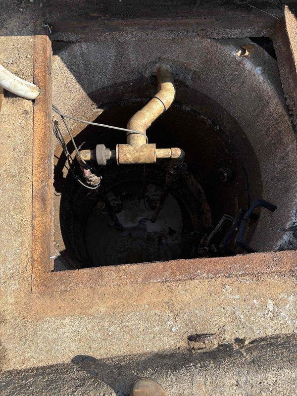 Performed inspection of underground utility vault and valve box systems. Documented current condition of plumbing infrastructure including brass pipe fittings, valve assemblies, and access points. Both locations showed significant corrosion, moisture accumulation, and aging of metal components requiring assessment for future maintenance needs. Performed inspection of underground utility vault and valve box systems. Documented current condition of plumbing infrastructure including brass pipe fittings, valve assemblies, and access points. Both locations showed significant corrosion, moisture accumulation, and aging of metal components requiring assessment for future maintenance needs.