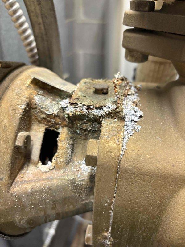 # Toilet Supply Line Replacement and Leak Repair
Responded to service call for running toilets. Upon inspection, discovered failed toilet supply line with significant water damage evidenced by rust-colored staining on wall surfaces and mineral deposits on plumbing components. The existing braided supply line showed signs of deterioration and corrosion at connection points.
Removed deteriorated supply line and cleaned mineral buildup from valve connections and fittings. Installed new flexible braided supply line with proper compression fittings to ensure watertight seal. Tested system for proper operation and verified no active leaks at wall connection or toilet tank connection points. # Toilet Supply Line Replacement and Leak Repair
Responded to service call for running toilets. Upon inspection, discovered failed toilet supply line with significant water damage evidenced by rust-colored staining on wall surfaces and mineral deposits on plumbing components. The existing braided supply line showed signs of deterioration and corrosion at connection points.
Removed deteriorated supply line and cleaned mineral buildup from valve connections and fittings. Installed new flexible braided supply line with proper compression fittings to ensure watertight seal. Tested system for proper operation and verified no active leaks at wall connection or toilet tank connection points.