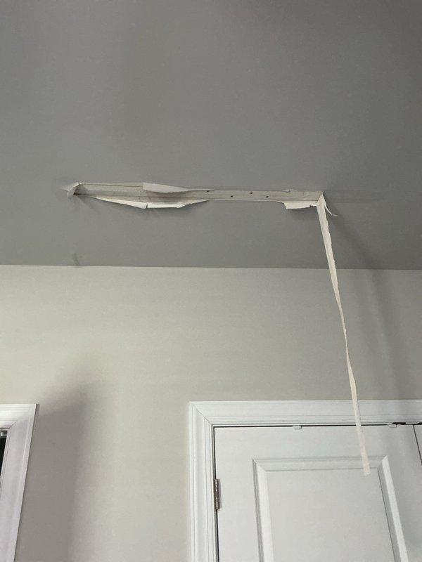 Chamblee, GA - Responded to reported water leak in ceiling originating from dishwasher area. Upon inspection, identified water damage at wall-ceiling junction with crown molding separation and deterioration. Documented conditions with photographs showing trim detachment and structural concerns requiring further assessment and repair. Chamblee, GA - Responded to reported water leak in ceiling originating from dishwasher area. Upon inspection, identified water damage at wall-ceiling junction with crown molding separation and deterioration. Documented conditions with photographs showing trim detachment and structural concerns requiring further assessment and repair.