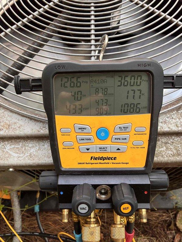 Performed comprehensive HVAC maintenance service addressing efficiency concerns in upper levels of home. Conducted refrigerant system diagnostics using manifold gauges, measuring pressures and temperatures at outdoor condenser unit to verify proper system charge and operation. Inspected A.O. Smith ProLine water heater installation in attic space, checking copper piping connections, brass fittings, and overall unit condition to ensure proper integration with HVAC system performance. Performed comprehensive HVAC maintenance service addressing efficiency concerns in upper levels of home. Conducted refrigerant system diagnostics using manifold gauges, measuring pressures and temperatures at outdoor condenser unit to verify proper system charge and operation. Inspected A.O. Smith ProLine water heater installation in attic space, checking copper piping connections, brass fittings, and overall unit condition to ensure proper integration with HVAC system performance.