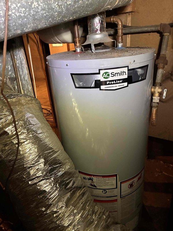 Performed comprehensive HVAC maintenance service addressing efficiency concerns in upper levels of home. Conducted refrigerant system diagnostics using manifold gauges, measuring pressures and temperatures at outdoor condenser unit to verify proper system charge and operation. Inspected A.O. Smith ProLine water heater installation in attic space, checking copper piping connections, brass fittings, and overall unit condition to ensure proper integration with HVAC system performance. Performed comprehensive HVAC maintenance service addressing efficiency concerns in upper levels of home. Conducted refrigerant system diagnostics using manifold gauges, measuring pressures and temperatures at outdoor condenser unit to verify proper system charge and operation. Inspected A.O. Smith ProLine water heater installation in attic space, checking copper piping connections, brass fittings, and overall unit condition to ensure proper integration with HVAC system performance.