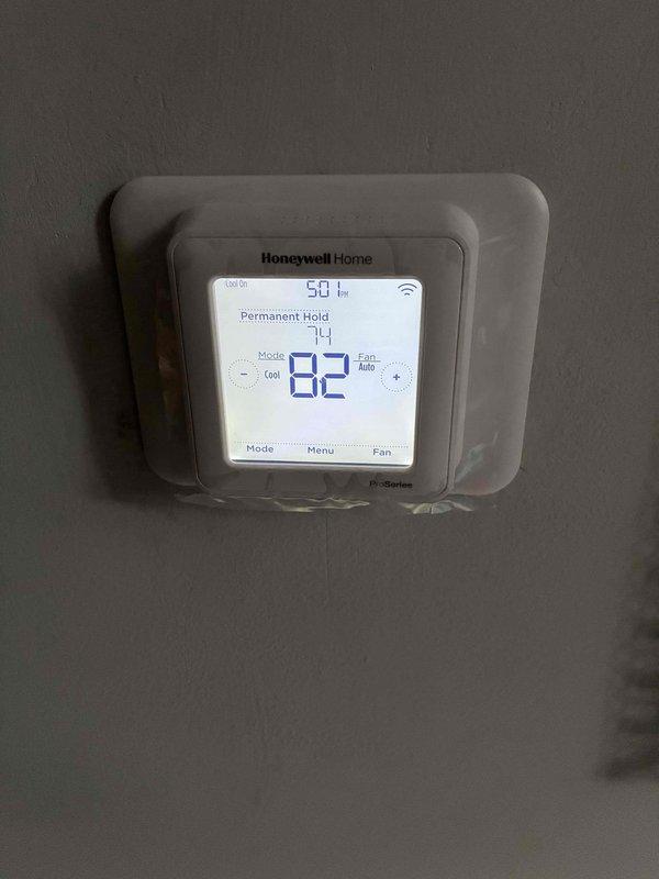 Completed installation of new air conditioning system and evaporator coil in residential basement location. Installed Honeywell Home T6 WiFi-enabled thermostat with protective cover on main level, pulling new low voltage control wiring from equipment to thermostat location to ensure proper communication between system components. All equipment tested and operational upon completion, with thermostat programmed and connected to WiFi network for remote access capability. Completed installation of new air conditioning system and evaporator coil in residential basement location. Installed Honeywell Home T6 WiFi-enabled thermostat with protective cover on main level, pulling new low voltage control wiring from equipment to thermostat location to ensure proper communication between system components. All equipment tested and operational upon completion, with thermostat programmed and connected to WiFi network for remote access capability.