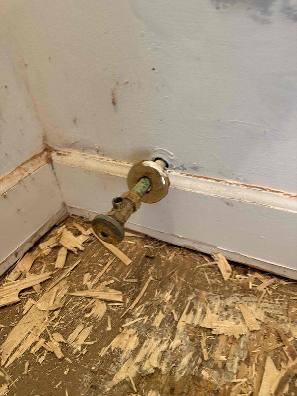 Responded to plumbing service call for leaking shut-off valve discovered during bathroom fixture removal for flooring installation. Upon arrival, assessed two wall-mounted water supply valves with brass handles in area where sink had been disconnected. Confirmed active leak from valve body as reported by flooring contractor. Replaced faulty shut-off valve with new quarter-turn angle stop valve, ensuring proper seal and connection to existing copper supply line. Tested valve operation under full water pressure to verify complete shutoff capability with no leakage. Left plumbing connections secure and ready for extended period without fixtures installed, allowing flooring work to proceed without water damage concerns. Responded to plumbing service call for leaking shut-off valve discovered during bathroom fixture removal for flooring installation. Upon arrival, assessed two wall-mounted water supply valves with brass handles in area where sink had been disconnected. Confirmed active leak from valve body as reported by flooring contractor. Replaced faulty shut-off valve with new quarter-turn angle stop valve, ensuring proper seal and connection to existing copper supply line. Tested valve operation under full water pressure to verify complete shutoff capability with no leakage. Left plumbing connections secure and ready for extended period without fixtures installed, allowing flooring work to proceed without water damage concerns.