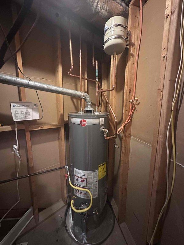 Completed installation of new Rheem residential water heater with proper copper piping connections for hot and cold water lines. Installed HALO water treatment system integrated with main plumbing infrastructure, including necessary pipe fittings and connections to ensure optimal water quality throughout the residence. All components were professionally mounted, secured to wall studs, and tested for proper operation and leak-free performance. Completed installation of new Rheem residential water heater with proper copper piping connections for hot and cold water lines. Installed HALO water treatment system integrated with main plumbing infrastructure, including necessary pipe fittings and connections to ensure optimal water quality throughout the residence. All components were professionally mounted, secured to wall studs, and tested for proper operation and leak-free performance.