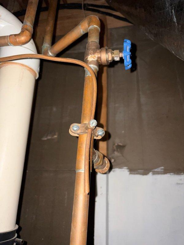 Responded to service call for leaking 80-gallon gas water heater. Upon arrival, performed inspection of existing unit and confirmed active leak requiring immediate replacement due to customer's travel schedule. Successfully removed failed water heater and installed new A.O. Smith ProMax gas water heater. Connected copper supply lines to top of unit, installed shutoff valve with blue handle on cold water supply line, and secured all piping with appropriate mounting brackets to wall. Completed all gas line connections, tested system for proper operation and leaks, and verified temperature and pressure relief valve functionality. Installation completed prior to customer's departure time, ensuring no water damage would occur during their absence. Responded to service call for leaking 80-gallon gas water heater. Upon arrival, performed inspection of existing unit and confirmed active leak requiring immediate replacement due to customer's travel schedule. Successfully removed failed water heater and installed new A.O. Smith ProMax gas water heater. Connected copper supply lines to top of unit, installed shutoff valve with blue handle on cold water supply line, and secured all piping with appropriate mounting brackets to wall. Completed all gas line connections, tested system for proper operation and leaks, and verified temperature and pressure relief valve functionality. Installation completed prior to customer's departure time, ensuring no water damage would occur during their absence.