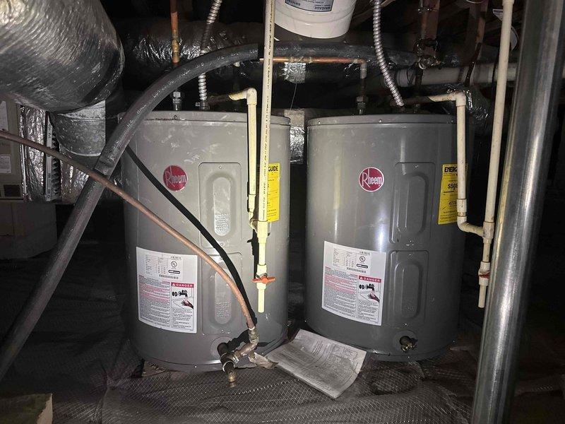 Responded to no hot water complaint at property with dual Rheem water heater installation. Upon arrival, conducted visual inspection of both units and associated plumbing components. Assessed gas supply, electrical connections, and venting systems for proper operation. Verified temperature and pressure relief valves, examined copper supply lines and flexible connectors for leaks or damage. Tested heating elements and thermostat functionality on both units to identify source of failure. Restored hot water service to the property and confirmed proper operation of the water heating system before departure. Responded to no hot water complaint at property with dual Rheem water heater installation. Upon arrival, conducted visual inspection of both units and associated plumbing components. Assessed gas supply, electrical connections, and venting systems for proper operation. Verified temperature and pressure relief valves, examined copper supply lines and flexible connectors for leaks or damage. Tested heating elements and thermostat functionality on both units to identify source of failure. Restored hot water service to the property and confirmed proper operation of the water heating system before departure.