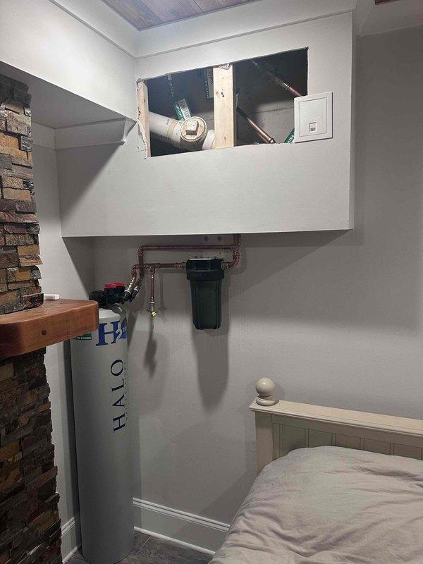 Performed follow-up service on whole-house water filtration system to purge air from supply lines. Inspected HALO water treatment system installation, verified proper operation of shut-off valves, and confirmed all copper piping connections were secure and leak-free. System is now functioning properly with no air pockets in the filtration lines. Performed follow-up service on whole-house water filtration system to purge air from supply lines. Inspected HALO water treatment system installation, verified proper operation of shut-off valves, and confirmed all copper piping connections were secure and leak-free. System is now functioning properly with no air pockets in the filtration lines.