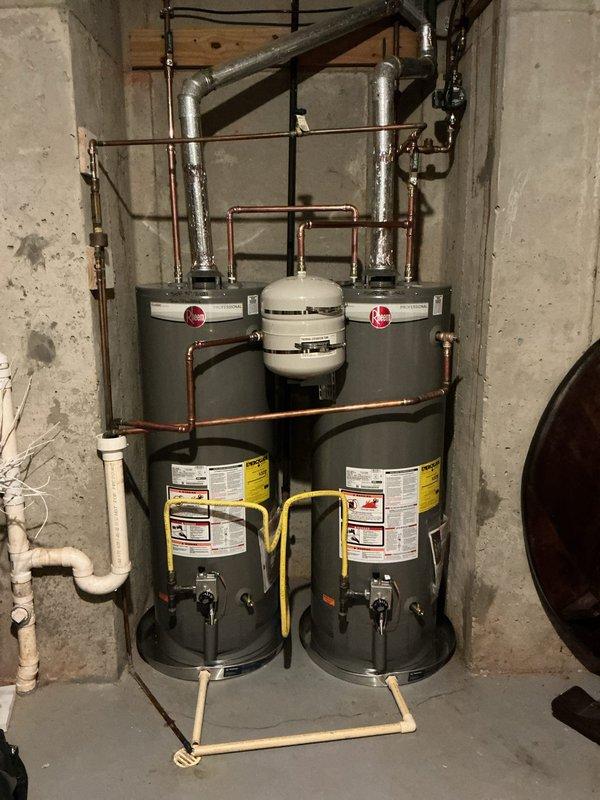 Completed installation of dual water heater system with associated copper piping, expansion tank, and gas line connections. Addressed toilet flange replacement and repaired water-damaged flooring area, including cleanup of existing staining and ensuring proper seal to prevent future leakage. Completed installation of dual water heater system with associated copper piping, expansion tank, and gas line connections. Addressed toilet flange replacement and repaired water-damaged flooring area, including cleanup of existing staining and ensuring proper seal to prevent future leakage.