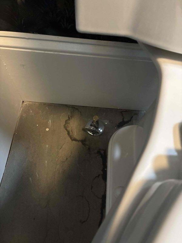 Completed follow-up inspection on toilet installation previously serviced by another technician. Documented existing conditions with photographs showing significant water damage on wall behind toilet fixture with brown staining and deterioration around supply line connection point, indicating prolonged moisture intrusion. Photographed toilet tank mounting hardware and bowl assembly to verify installation integrity and identify potential leak source requiring remediation. Completed follow-up inspection on toilet installation previously serviced by another technician. Documented existing conditions with photographs showing significant water damage on wall behind toilet fixture with brown staining and deterioration around supply line connection point, indicating prolonged moisture intrusion. Photographed toilet tank mounting hardware and bowl assembly to verify installation integrity and identify potential leak source requiring remediation.