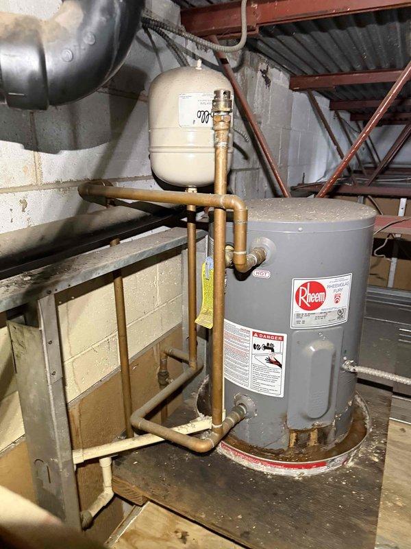 Completed extended diagnostic on HVAC system and water heating equipment. Performed comprehensive pressure testing and system evaluation using calibrated gauges to assess operational status of heating and cooling components. Inspected Rheem water heater installation, associated copper piping, expansion tank connections, and metal ductwork throughout mechanical space to identify any performance issues or required maintenance recommendations per quote specifications. Completed extended diagnostic on HVAC system and water heating equipment. Performed comprehensive pressure testing and system evaluation using calibrated gauges to assess operational status of heating and cooling components. Inspected Rheem water heater installation, associated copper piping, expansion tank connections, and metal ductwork throughout mechanical space to identify any performance issues or required maintenance recommendations per quote specifications.