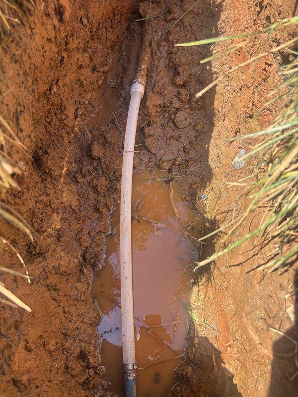 Completed water service line repair through hand excavation of trench in clay soil conditions. Exposed and replaced damaged section of water service pipe with new PVC piping and secure metal couplings, ensuring proper connection and alignment throughout the repair zone. Completed water service line repair through hand excavation of trench in clay soil conditions. Exposed and replaced damaged section of water service pipe with new PVC piping and secure metal couplings, ensuring proper connection and alignment throughout the repair zone.