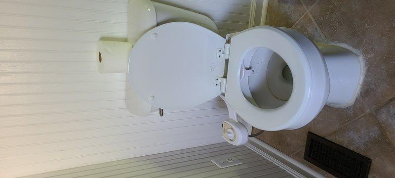 Removed existing toilet that was caulked to floor and installed customer-supplied Toto Drake toilet with new wax ring. Completed swap-out of old fixture with new unit, ensuring proper seal and secure mounting to flange. Removed existing toilet that was caulked to floor and installed customer-supplied Toto Drake toilet with new wax ring. Completed swap-out of old fixture with new unit, ensuring proper seal and secure mounting to flange.