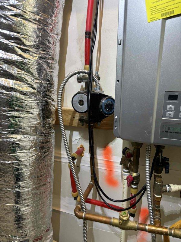 Responded to service call for tankless water heater experiencing audible alarm and loss of hot water output. Upon inspection, performed diagnostic evaluation of unit and associated plumbing connections, gas supply lines, electrical components, and venting system. Completed tankless water heater flush procedure to remove mineral buildup and scale deposits from heat exchanger, which was causing reduced flow and triggering error condition. Verified proper operation of all shutoff valves, gas line connections, and electrical controls. System tested and restored to normal operation with hot water delivery confirmed. Responded to service call for tankless water heater experiencing audible alarm and loss of hot water output. Upon inspection, performed diagnostic evaluation of unit and associated plumbing connections, gas supply lines, electrical components, and venting system. Completed tankless water heater flush procedure to remove mineral buildup and scale deposits from heat exchanger, which was causing reduced flow and triggering error condition. Verified proper operation of all shutoff valves, gas line connections, and electrical controls. System tested and restored to normal operation with hot water delivery confirmed.