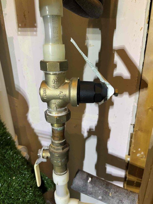 Completed professional installation of tankless water heater system with full plumbing integration. Installed new brass valve assembly with isolation capabilities, pressure relief components, and proper venting connections. Performed combustion analysis and gas pressure verification using calibrated differential manometer to ensure optimal performance and safety compliance. All connections tested and system commissioned successfully. Completed professional installation of tankless water heater system with full plumbing integration. Installed new brass valve assembly with isolation capabilities, pressure relief components, and proper venting connections. Performed combustion analysis and gas pressure verification using calibrated differential manometer to ensure optimal performance and safety compliance. All connections tested and system commissioned successfully.