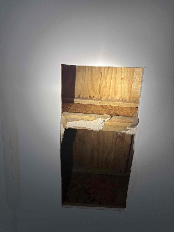 Responded to customer request for second opinion on shower leak. Performed thorough inspection of affected area, including opening drywall to access wall cavity and assess extent of water damage. Documented interior wall conditions, exposed framing, and insulation. Examined floor-wall junction and baseboard area for signs of moisture intrusion and water staining on flooring surface. Provided professional assessment of leak source and recommended repair solutions to customer. Responded to customer request for second opinion on shower leak. Performed thorough inspection of affected area, including opening drywall to access wall cavity and assess extent of water damage. Documented interior wall conditions, exposed framing, and insulation. Examined floor-wall junction and baseboard area for signs of moisture intrusion and water staining on flooring surface. Provided professional assessment of leak source and recommended repair solutions to customer.