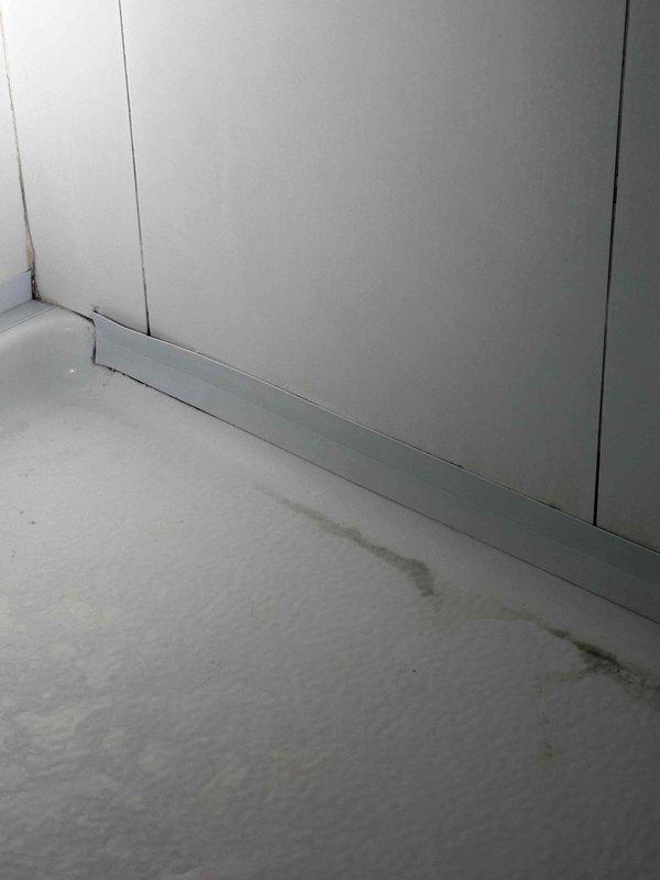Responded to customer request for second opinion on shower leak. Performed thorough inspection of affected area, including opening drywall to access wall cavity and assess extent of water damage. Documented interior wall conditions, exposed framing, and insulation. Examined floor-wall junction and baseboard area for signs of moisture intrusion and water staining on flooring surface. Provided professional assessment of leak source and recommended repair solutions to customer. Responded to customer request for second opinion on shower leak. Performed thorough inspection of affected area, including opening drywall to access wall cavity and assess extent of water damage. Documented interior wall conditions, exposed framing, and insulation. Examined floor-wall junction and baseboard area for signs of moisture intrusion and water staining on flooring surface. Provided professional assessment of leak source and recommended repair solutions to customer.