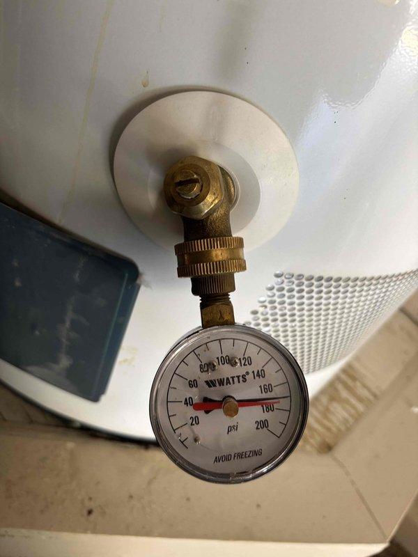 Responded to emergency call for high water pressure surge causing refrigerator icemaker line failure and leak. Upon arrival, confirmed water supply had been shut off to prevent further damage. Conducted comprehensive pressure testing at exterior hose bib and water heater connection points using calibrated pressure gauges. Readings indicated system pressure approximately 80 PSI, which falls within acceptable range but may experience initial surge conditions due to pressure regulator malfunction or water hammer effect. Documented pressure conditions with photographic evidence showing gauge readings at multiple test locations. Identified need for pressure reducing valve inspection or replacement to eliminate initial surge phenomenon that caused line failure. Recommended installation of water hammer arrestor if not currently present in system to prevent future pressure spikes when fixtures are opened rapidly. Responded to emergency call for high water pressure surge causing refrigerator icemaker line failure and leak. Upon arrival, confirmed water supply had been shut off to prevent further damage. Conducted comprehensive pressure testing at exterior hose bib and water heater connection points using calibrated pressure gauges. Readings indicated system pressure approximately 80 PSI, which falls within acceptable range but may experience initial surge conditions due to pressure regulator malfunction or water hammer effect. Documented pressure conditions with photographic evidence showing gauge readings at multiple test locations. Identified need for pressure reducing valve inspection or replacement to eliminate initial surge phenomenon that caused line failure. Recommended installation of water hammer arrestor if not currently present in system to prevent future pressure spikes when fixtures are opened rapidly.
