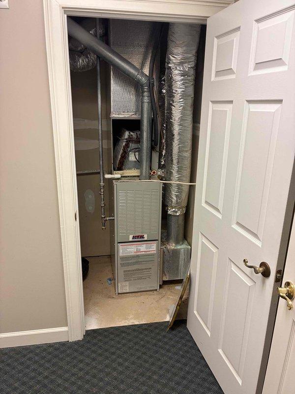 Responded to service call for two non-functioning HVAC systems. Inspected main level unit from 1993 reporting inadequate cooling performance and upper level 2021 system that ceased operation on 09/20. Accessed property using provided lockbox code, performed diagnostic assessment of both systems, and documented equipment conditions with photographic evidence showing furnace unit, ductwork configuration, and thermostat controls for service records. Responded to service call for two non-functioning HVAC systems. Inspected main level unit from 1993 reporting inadequate cooling performance and upper level 2021 system that ceased operation on 09/20. Accessed property using provided lockbox code, performed diagnostic assessment of both systems, and documented equipment conditions with photographic evidence showing furnace unit, ductwork configuration, and thermostat controls for service records.