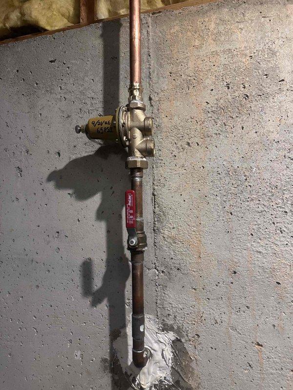 Installed new sump pump system with PVC discharge piping in basement utility area and replaced pressure reducing valve (PRV) on main water supply line with brass valve assembly and red-handled ball valve shutoff. Both installations completed to ensure proper water management and pressure regulation for the property. Installed new sump pump system with PVC discharge piping in basement utility area and replaced pressure reducing valve (PRV) on main water supply line with brass valve assembly and red-handled ball valve shutoff. Both installations completed to ensure proper water management and pressure regulation for the property.