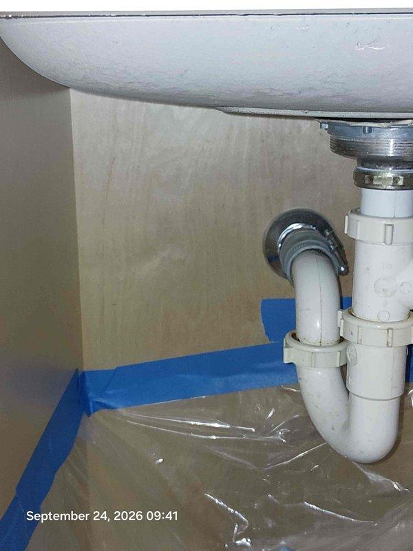 Responded to clogged drain call and successfully cleared blockage using drain snake equipment. Accessed drain line through sink P-trap assembly beneath bathroom vanity. Protective materials were placed in cabinet area to contain water and debris during service. After snaking the line, all plumbing connections were reassembled and tested for proper drainage flow with no leaks detected. Responded to clogged drain call and successfully cleared blockage using drain snake equipment. Accessed drain line through sink P-trap assembly beneath bathroom vanity. Protective materials were placed in cabinet area to contain water and debris during service. After snaking the line, all plumbing connections were reassembled and tested for proper drainage flow with no leaks detected.