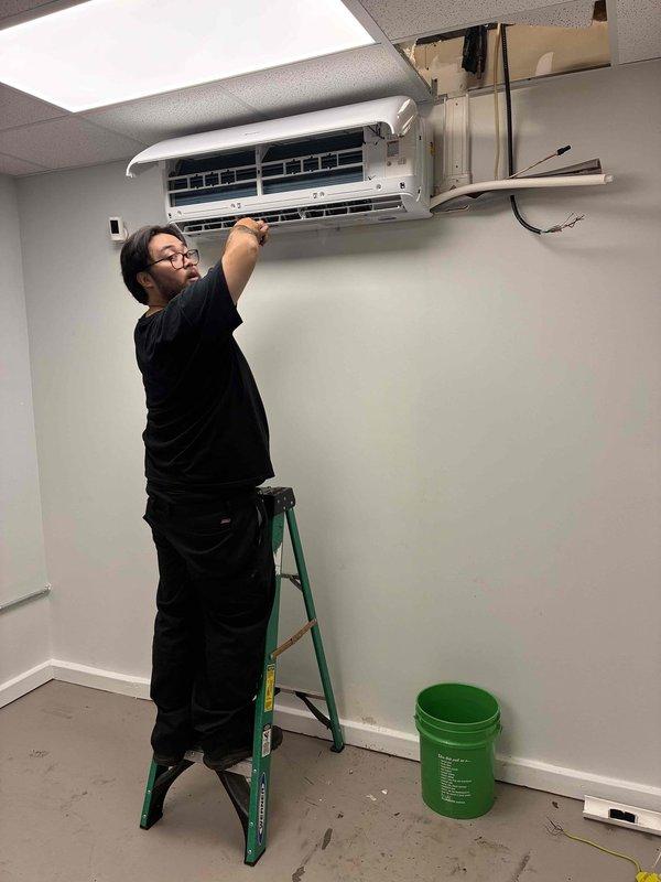 Replaced ductless mini-split indoor air handler unit in commercial space, requiring roof access for refrigerant line connections and electrical work. Removed existing wall-mounted unit showing signs of corrosion on copper piping, disconnected electrical wiring from terminal block, and installed new air handler with proper mounting and system connections. Tested unit operation and verified proper airflow upon completion. Replaced ductless mini-split indoor air handler unit in commercial space, requiring roof access for refrigerant line connections and electrical work. Removed existing wall-mounted unit showing signs of corrosion on copper piping, disconnected electrical wiring from terminal block, and installed new air handler with proper mounting and system connections. Tested unit operation and verified proper airflow upon completion.