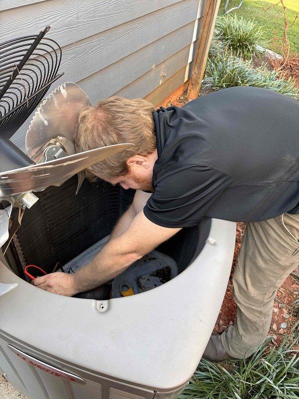Responded to no cooling call for 12-year-old residential air conditioning system. Upon arrival, confirmed outdoor condensing unit was completely inoperative with no power to system. Accessed attic-mounted air handler and inspected electrical connections, control board, and safety switches. Proceeded to outdoor unit and removed access panels to diagnose condenser components. Performed comprehensive electrical testing including voltage checks at disconnect, contactor, capacitor, and compressor terminals. Identified failed component preventing system operation. Discussed repair options and replacement recommendations with customer given age of equipment. System requires parts and further repair to restore cooling functionality. Responded to no cooling call for 12-year-old residential air conditioning system. Upon arrival, confirmed outdoor condensing unit was completely inoperative with no power to system. Accessed attic-mounted air handler and inspected electrical connections, control board, and safety switches. Proceeded to outdoor unit and removed access panels to diagnose condenser components. Performed comprehensive electrical testing including voltage checks at disconnect, contactor, capacitor, and compressor terminals. Identified failed component preventing system operation. Discussed repair options and replacement recommendations with customer given age of equipment. System requires parts and further repair to restore cooling functionality.