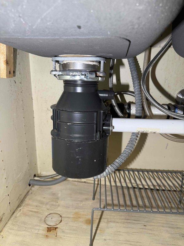 Completed three-item service call addressing multiple plumbing needs. Successfully installed new customer-provided toilet in bathroom and removed existing fixture for disposal. Installed new garbage disposal unit in kitchen sink where no disposal previously existed, including all necessary drain connections, mounting hardware, and electrical hookup. Diagnosed and repaired leak on master bathroom tub, resolving water intrusion issue. All installations tested and verified operational before departure. Completed three-item service call addressing multiple plumbing needs. Successfully installed new customer-provided toilet in bathroom and removed existing fixture for disposal. Installed new garbage disposal unit in kitchen sink where no disposal previously existed, including all necessary drain connections, mounting hardware, and electrical hookup. Diagnosed and repaired leak on master bathroom tub, resolving water intrusion issue. All installations tested and verified operational before departure.