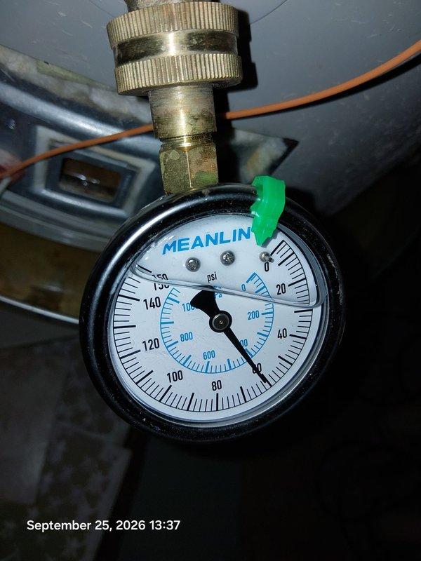 Responded to service call for non-operational water heater. Upon inspection, identified excessive corrosion on tank insulation jacket and concerning moisture accumulation on exterior surfaces indicating potential tank failure. Pressure gauge reading showed system was operating within normal parameters at time of inspection. Documented equipment condition with photos showing advanced deterioration of tank components and recommended immediate replacement due to compromised tank integrity and high risk of catastrophic failure. Responded to service call for non-operational water heater. Upon inspection, identified excessive corrosion on tank insulation jacket and concerning moisture accumulation on exterior surfaces indicating potential tank failure. Pressure gauge reading showed system was operating within normal parameters at time of inspection. Documented equipment condition with photos showing advanced deterioration of tank components and recommended immediate replacement due to compromised tank integrity and high risk of catastrophic failure.