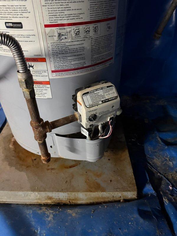 Responded to service call for 11-year-old 40-gallon gas water heater with no hot water production. Upon inspection, discovered heavily corroded copper piping and evidence of water leakage at base of unit, indicating tank failure. Removed and disposed of failed water heater. Installed new 40-gallon gas water heater with fresh copper connections, gas control valve, and proper venting. Tested all connections for leaks, verified gas supply operation, and confirmed hot water delivery to fixtures throughout property. Responded to service call for 11-year-old 40-gallon gas water heater with no hot water production. Upon inspection, discovered heavily corroded copper piping and evidence of water leakage at base of unit, indicating tank failure. Removed and disposed of failed water heater. Installed new 40-gallon gas water heater with fresh copper connections, gas control valve, and proper venting. Tested all connections for leaks, verified gas supply operation, and confirmed hot water delivery to fixtures throughout property.