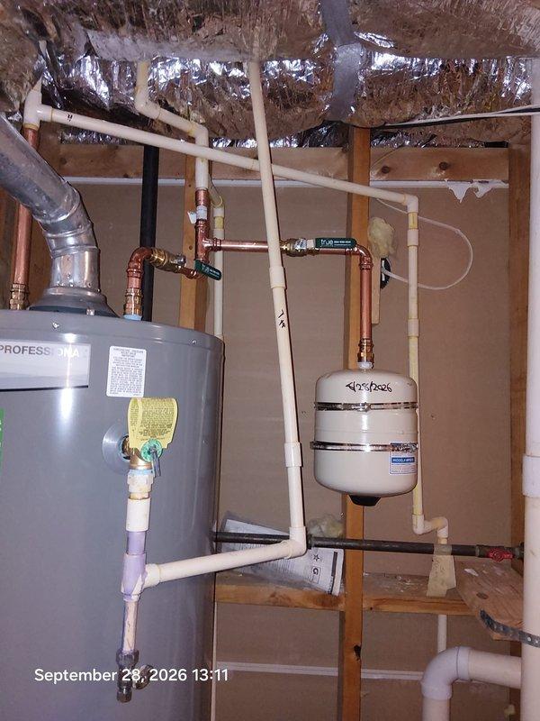 Completed replacement of 50-gallon Rheem Professional series residential water heater in basement utility area. Removed existing unit and installed new water heater with proper copper supply line connections, PVC venting system, brass shutoff valves, and Flexcon expansion tank. All plumbing connections secured with appropriate fittings and materials per manufacturer specifications and local code requirements. Completed replacement of 50-gallon Rheem Professional series residential water heater in basement utility area. Removed existing unit and installed new water heater with proper copper supply line connections, PVC venting system, brass shutoff valves, and Flexcon expansion tank. All plumbing connections secured with appropriate fittings and materials per manufacturer specifications and local code requirements.