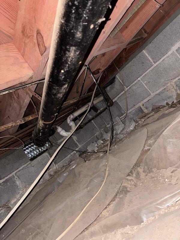 Responded to plumbing leak in washing machine drain piping located in crawl space. Upon inspection, identified failed connection at drain line causing water discharge into subfloor area. Repaired leaking pipe joint and tested system to verify proper drainage and seal integrity. Additionally replaced malfunctioning kitchen sink sprayer assembly with new unit and confirmed proper operation of spray function and hose retraction. Responded to plumbing leak in washing machine drain piping located in crawl space. Upon inspection, identified failed connection at drain line causing water discharge into subfloor area. Repaired leaking pipe joint and tested system to verify proper drainage and seal integrity. Additionally replaced malfunctioning kitchen sink sprayer assembly with new unit and confirmed proper operation of spray function and hose retraction.