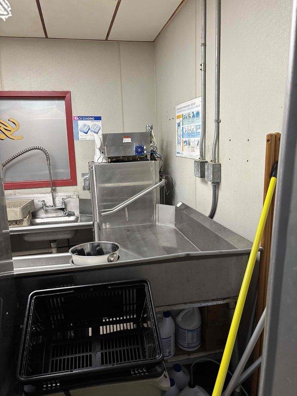 # Dishwasher Drain Repair
Responded to a drain issue affecting the commercial Ecolab dishwasher unit. Upon inspection, identified blockage in the drainage system preventing proper water discharge. Cleared the obstruction from the drain line and verified proper water flow through the system. Tested the dishwasher through a complete cycle to ensure the drain issue was fully resolved and the unit returned to normal operation. # Dishwasher Drain Repair
Responded to a drain issue affecting the commercial Ecolab dishwasher unit. Upon inspection, identified blockage in the drainage system preventing proper water discharge. Cleared the obstruction from the drain line and verified proper water flow through the system. Tested the dishwasher through a complete cycle to ensure the drain issue was fully resolved and the unit returned to normal operation.