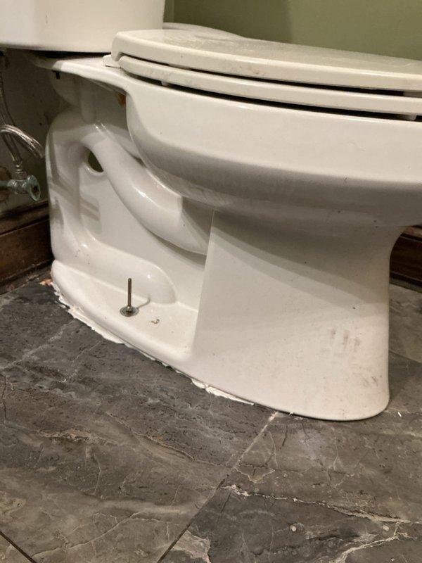 Responded to complaint of sewer odor in bathroom at rear of building. Upon inspection, discovered deteriorated wax ring seal at toilet base allowing sewer gases to escape into living space. Removed and replaced faulty wax ring seal, reset toilet to proper position, and tightened mounting bolts to manufacturer specifications. Verified proper seal and confirmed elimination of odor issue upon completion. Responded to complaint of sewer odor in bathroom at rear of building. Upon inspection, discovered deteriorated wax ring seal at toilet base allowing sewer gases to escape into living space. Removed and replaced faulty wax ring seal, reset toilet to proper position, and tightened mounting bolts to manufacturer specifications. Verified proper seal and confirmed elimination of odor issue upon completion.