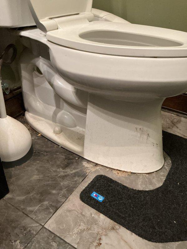 Responded to complaint of sewer odor in bathroom at rear of building. Upon inspection, discovered deteriorated wax ring seal at toilet base allowing sewer gases to escape into living space. Removed and replaced faulty wax ring seal, reset toilet to proper position, and tightened mounting bolts to manufacturer specifications. Verified proper seal and confirmed elimination of odor issue upon completion. Responded to complaint of sewer odor in bathroom at rear of building. Upon inspection, discovered deteriorated wax ring seal at toilet base allowing sewer gases to escape into living space. Removed and replaced faulty wax ring seal, reset toilet to proper position, and tightened mounting bolts to manufacturer specifications. Verified proper seal and confirmed elimination of odor issue upon completion.