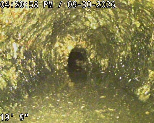 Atlanta, GA - Successfully snaked and cleared a cast iron drain line extending approximately 19 feet 9 inches. Video inspection revealed significant buildup of organic matter, algae, and mineral deposits coating the interior pipe walls, which was contributing to reduced flow capacity. Mechanical cable snaking was performed to restore proper drainage function through the affected section of the cast iron system. Atlanta, GA - Successfully snaked and cleared a cast iron drain line extending approximately 19 feet 9 inches. Video inspection revealed significant buildup of organic matter, algae, and mineral deposits coating the interior pipe walls, which was contributing to reduced flow capacity. Mechanical cable snaking was performed to restore proper drainage function through the affected section of the cast iron system.