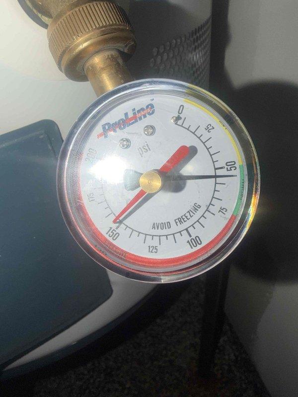 Responded to toilet leaking at base. Upon inspection, removed tank lid and examined internal components including flush valve assembly and fill valve. Inspected wax ring seal at toilet base and water supply connections. Verified system pressure at approximately 50-60 PSI using pressure gauge. Documented existing mineral deposits and tank condition, then proceeded with necessary repairs to eliminate leak at base. Responded to toilet leaking at base. Upon inspection, removed tank lid and examined internal components including flush valve assembly and fill valve. Inspected wax ring seal at toilet base and water supply connections. Verified system pressure at approximately 50-60 PSI using pressure gauge. Documented existing mineral deposits and tank condition, then proceeded with necessary repairs to eliminate leak at base.
