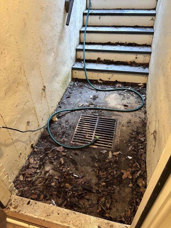Responded to service call for malfunctioning sump pump system with water pooling in basement. Upon inspection, found sump pump operational with power indicator light illuminated, but system failing to effectively remove water. Replaced tailpipe (TP) discharge line and cleared debris from outdoor drainage area and sump pit. Observed significant sediment accumulation in pit and standing water with partially submerged float switch component. System appears to be under warranty coverage and may require follow-up inspection to verify proper pump cycling and discharge flow. Responded to service call for malfunctioning sump pump system with water pooling in basement. Upon inspection, found sump pump operational with power indicator light illuminated, but system failing to effectively remove water. Replaced tailpipe (TP) discharge line and cleared debris from outdoor drainage area and sump pit. Observed significant sediment accumulation in pit and standing water with partially submerged float switch component. System appears to be under warranty coverage and may require follow-up inspection to verify proper pump cycling and discharge flow.