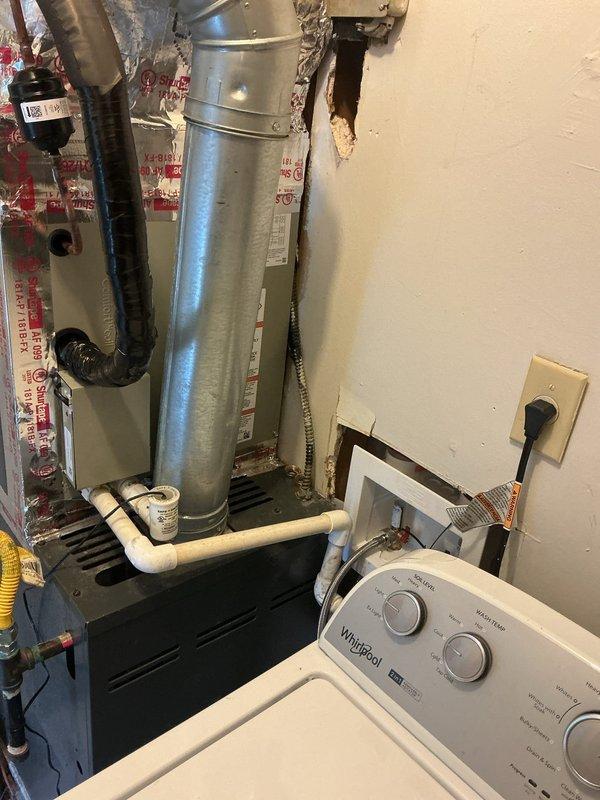 Replaced the failed evaporator coil on the indoor air handler, including recovery of refrigerant, installation of a new coil with a new liquid line filter drier, and re-insulation of the refrigerant lines and coil section. Pressure tested and evacuated the system to a final vacuum of 218 microns with a stable rate of rise before recharging. Restored the system to proper operation. Replaced the failed evaporator coil on the indoor air handler, including recovery of refrigerant, installation of a new coil with a new liquid line filter drier, and re-insulation of the refrigerant lines and coil section. Pressure tested and evacuated the system to a final vacuum of 218 microns with a stable rate of rise before recharging. Restored the system to proper operation.