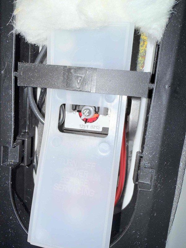 Followed up on a customer complaint of lukewarm hot water after a temperature and pressure (T&P) relief valve installation. Inspected the water heater upper thermostat compartment and found the thermostat set at 125°F. Accessed the thermostat behind the protective cover and adjusted the setpoint to raise the water temperature, then confirmed the unit was operating properly. Followed up on a customer complaint of lukewarm hot water after a temperature and pressure (T&P) relief valve installation. Inspected the water heater upper thermostat compartment and found the thermostat set at 125°F. Accessed the thermostat behind the protective cover and adjusted the setpoint to raise the water temperature, then confirmed the unit was operating properly.