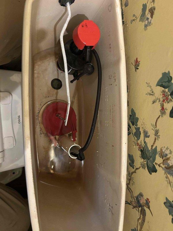 Inspected the running toilet and found the flapper and fill valve assembly worn, with mineral buildup and staining throughout the tank, causing continuous water flow into the bowl. Serviced the tank components to restore proper seal and water-level control, then tested flush and refill cycles to confirm the leak was resolved. Checked the other toilet in the home and found similar tank conditions, with the fill valve and flapper assembly showing comparable wear. Inspected the running toilet and found the flapper and fill valve assembly worn, with mineral buildup and staining throughout the tank, causing continuous water flow into the bowl. Serviced the tank components to restore proper seal and water-level control, then tested flush and refill cycles to confirm the leak was resolved. Checked the other toilet in the home and found similar tank conditions, with the fill valve and flapper assembly showing comparable wear.