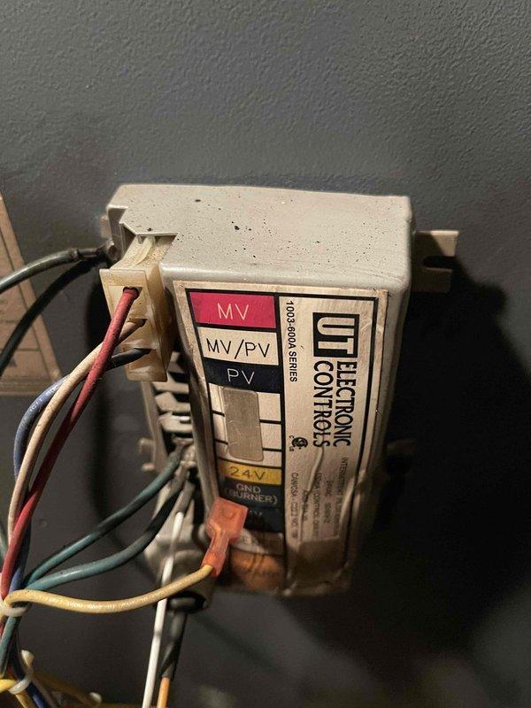 Responded to no heat complaint on steam boiler system. Inspected electronic control module with multiple terminal connections and verified proper voltage to components. Examined piping assembly and mechanical connections as part of troubleshooting process. System restored to proper operation.