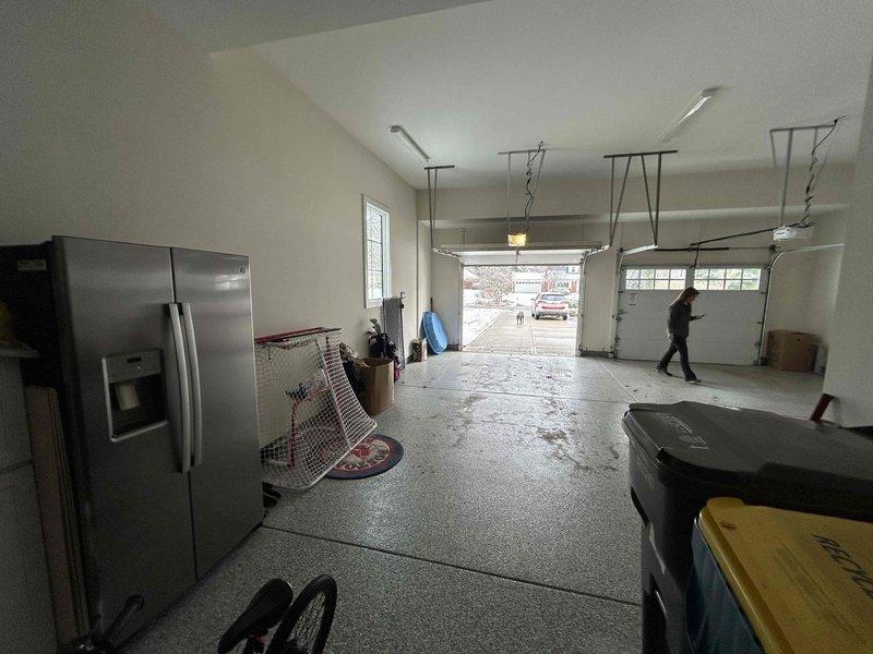 Conducted site inspection for full system replacement at residential property with Nolan, the onsite supervisor. Assessment included evaluation of existing ceiling-mounted thermostat and garage environment where potential equipment installation would occur. Documented current system configuration to prepare comprehensive replacement quote.