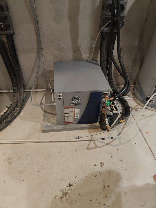 Successfully replaced upstairs Water Furnace split system under warranty. Performed line-set flush with nitrogen purge and installed new liquid line solenoid valve and filter drier. Removed old system for return to manufacturer for warranty processing.